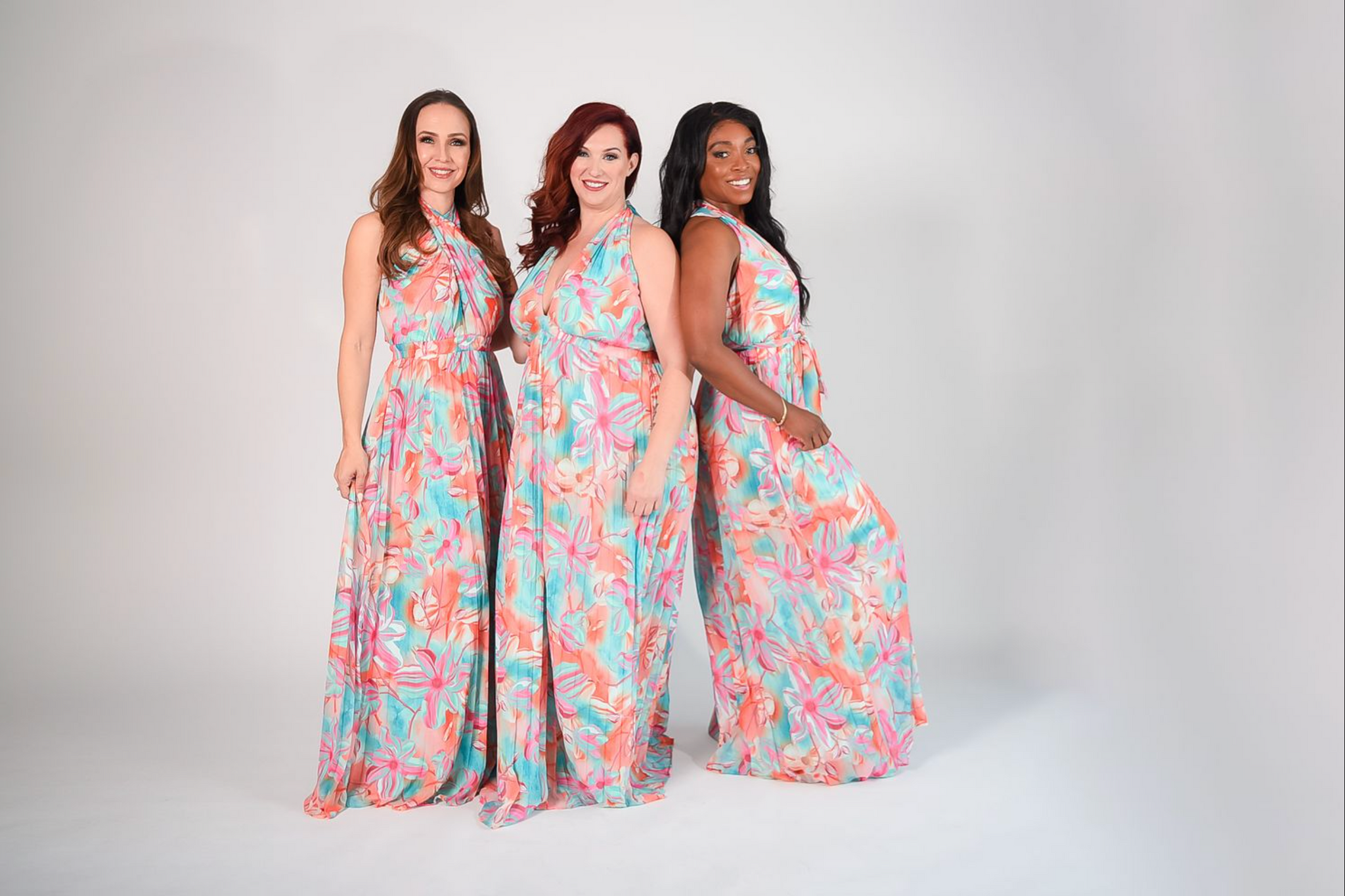 Floral print pleated halter maxi with convertible straps you can tie any way you'd like 