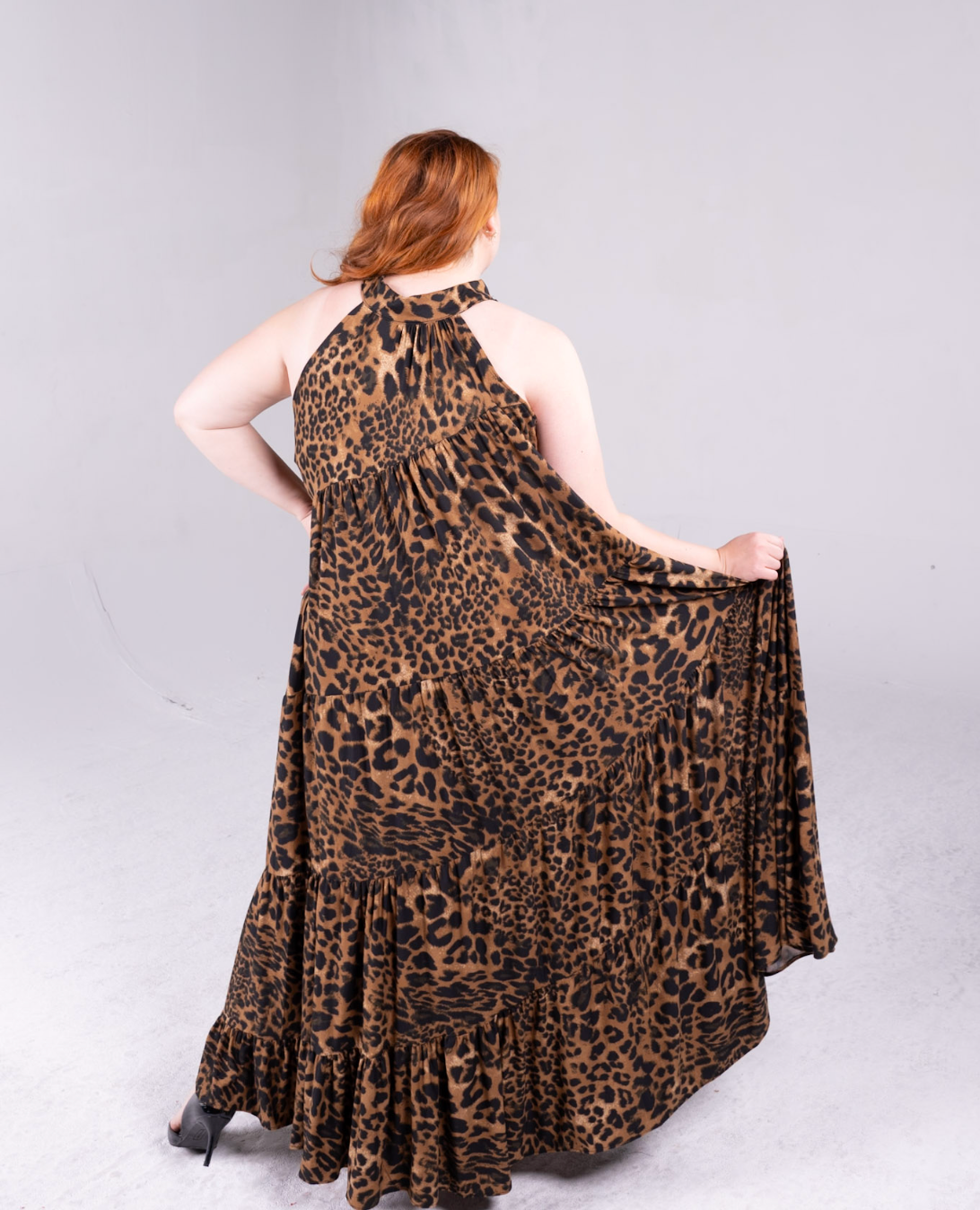 leopard print maxi dress with pockets, and neck tie to secure the top of the dress 
