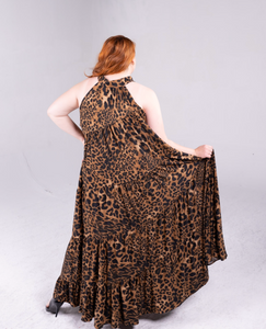 leopard print maxi dress with pockets, and neck tie to secure the top of the dress 
