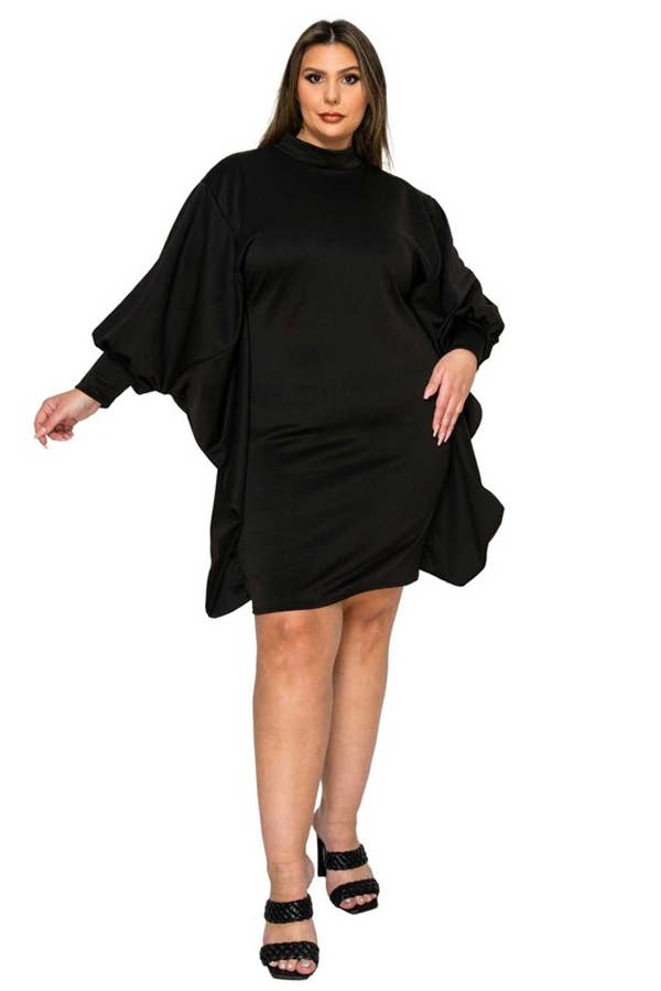 A Woman wearing a black dress with a dolman-style sleeve