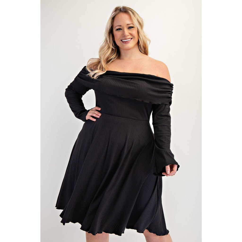 Woman wearing a black off-shoulder dress