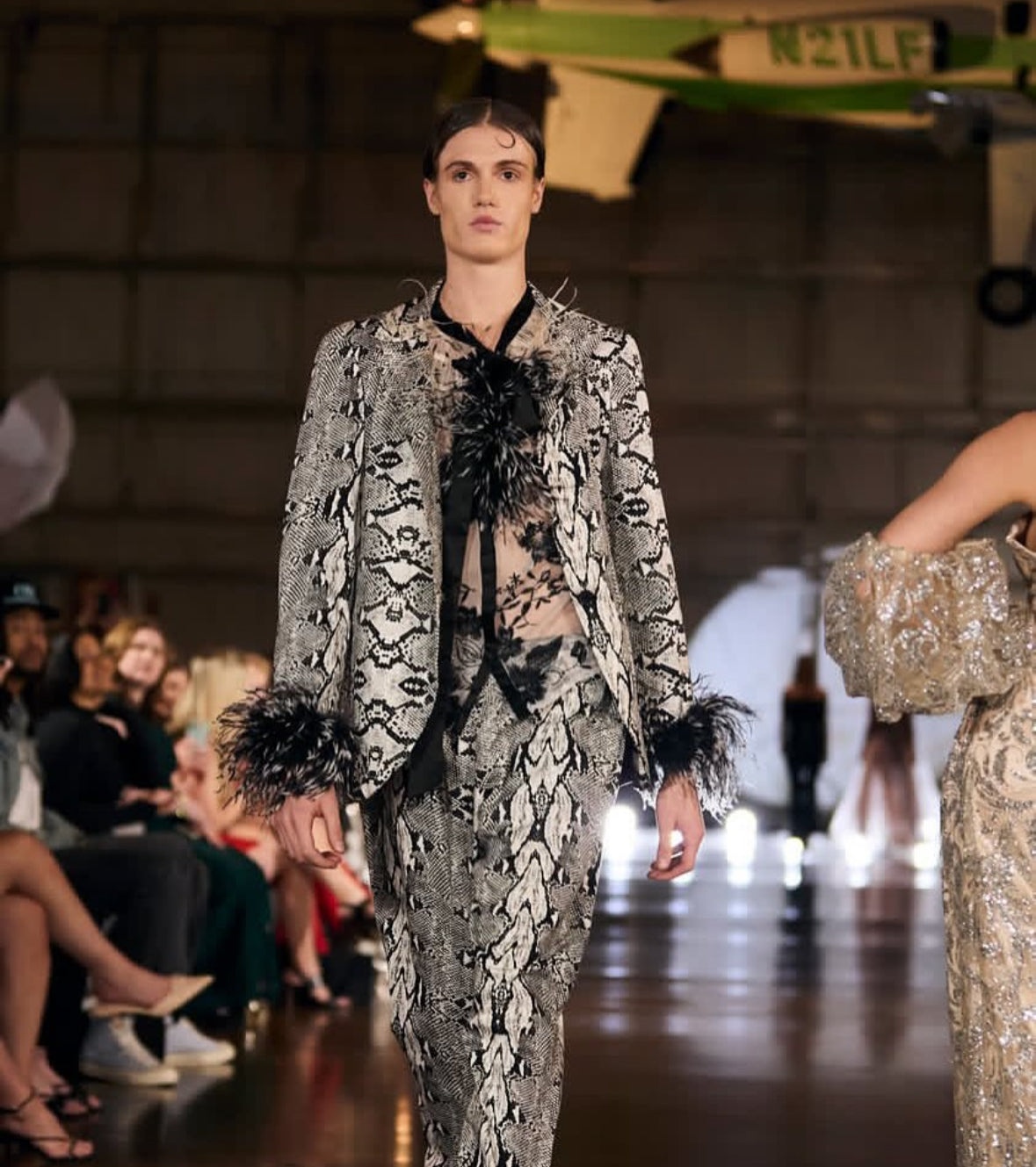 Snakeskin Print Suit With Black And White Feather Cuffs